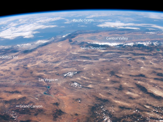 The region’s climate is highly varied and strongly influenced by topography, storm tracks, and proximity to oceans (seen here from space).